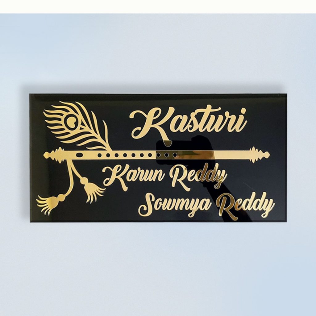 Kasturi Niwas Black and Golden Acrylic Nameplate